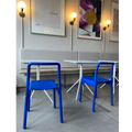 Blue chairs use felt pads with recycled material